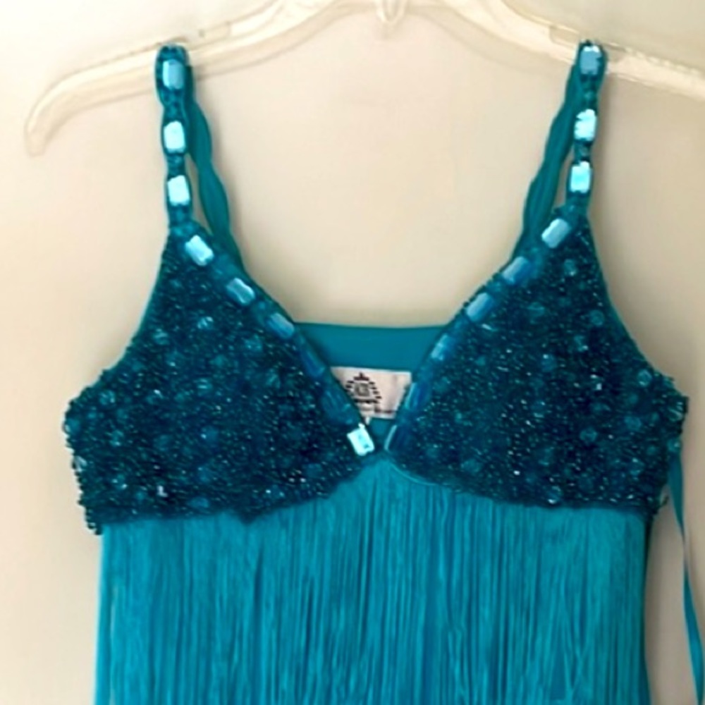 Turquoise fringe dress perfect for Latin dance. Message for more details.